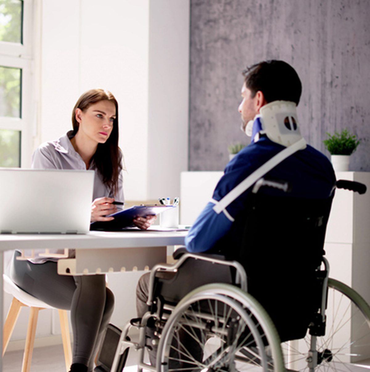 Professional discussion with wheelchair user