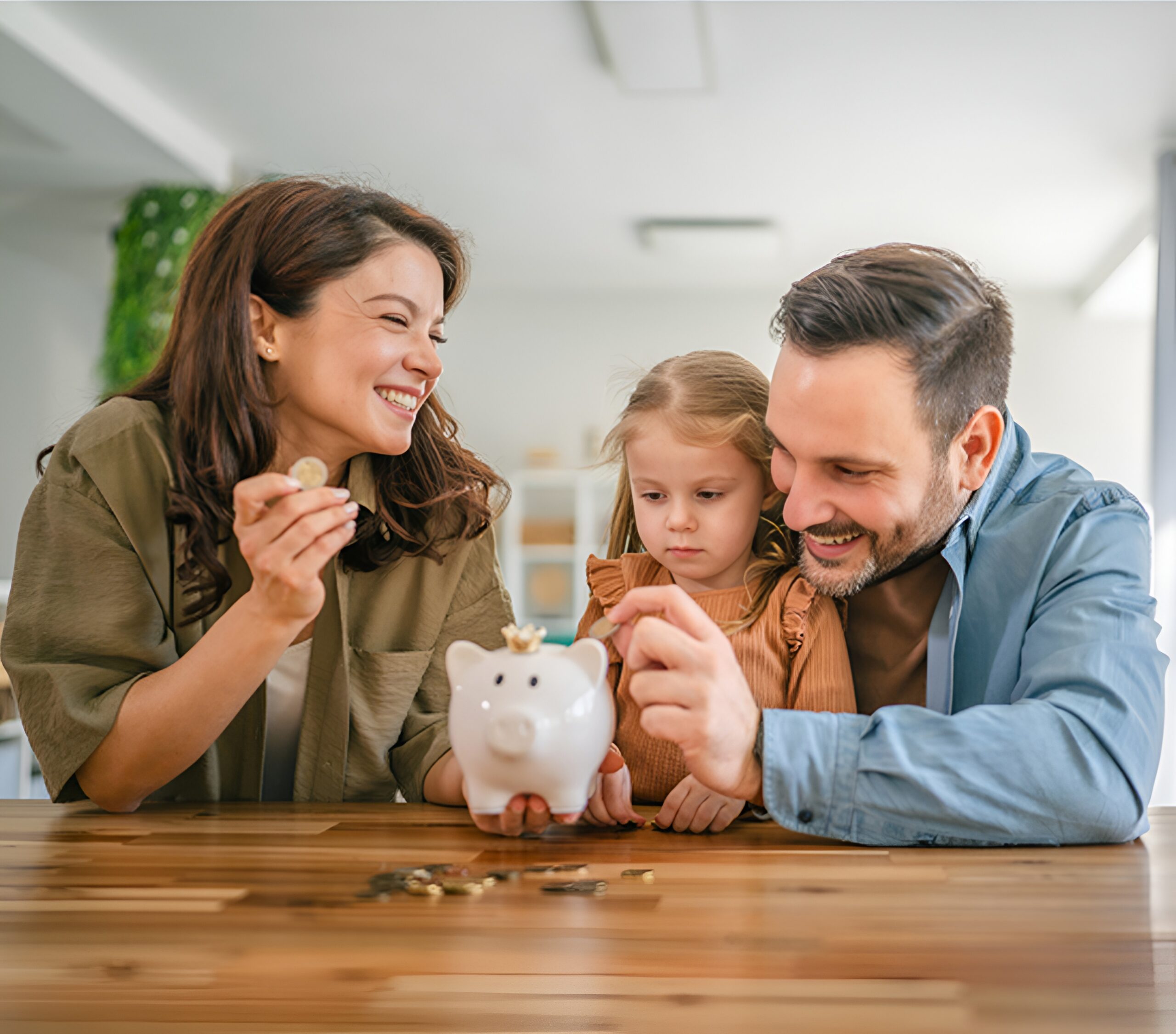 Parents teaching child about savings