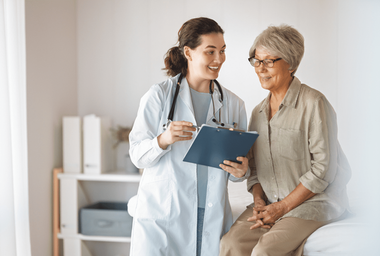 Healthcare visit with doctor and older patient